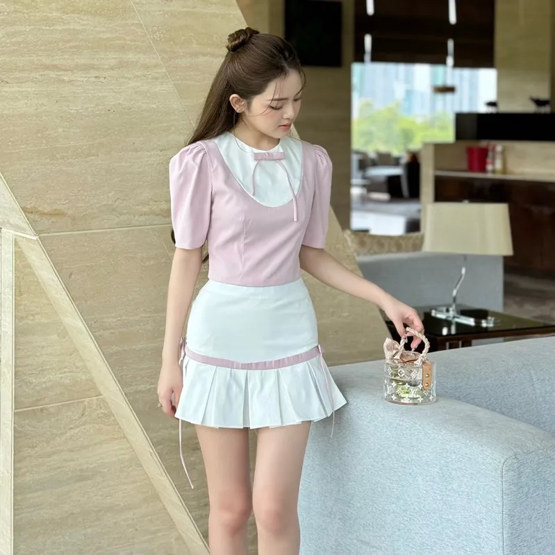 Ảnh Áo dáng ngắn tay phồng đính nơ màu hồng phối trắng PRINCESS phong cách nữ tính - Simple Twist 3