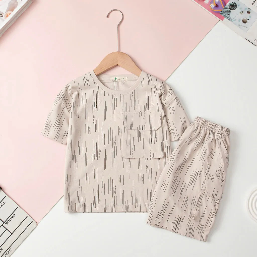 Ảnh Bộ cotton Bé trai túi ngực cổ tròn ngắn tay quần túi hộp size 4 đến 14 tuổi 1