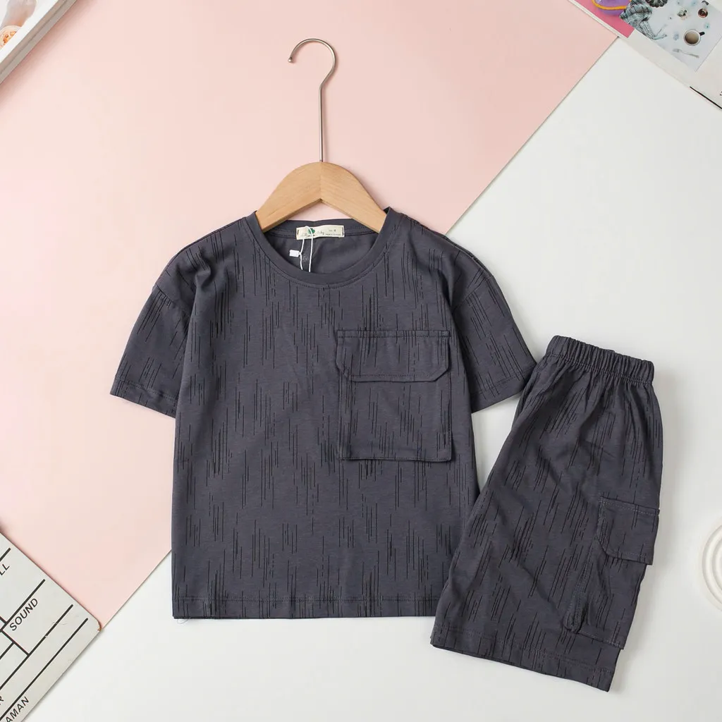 Ảnh Bộ cotton Bé trai túi ngực cổ tròn ngắn tay quần túi hộp size 4 đến 14 tuổi 2