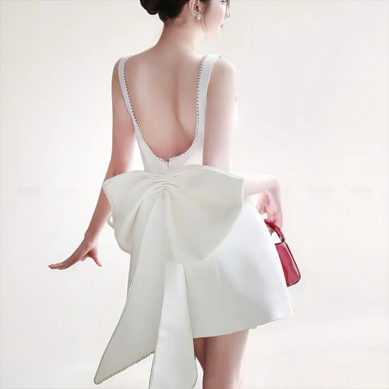 Ảnh Đầm dự tiệc MINA hở lưng dáng ngắn chữ A chất Taffta màu trắng quyến rũ MN308 2
