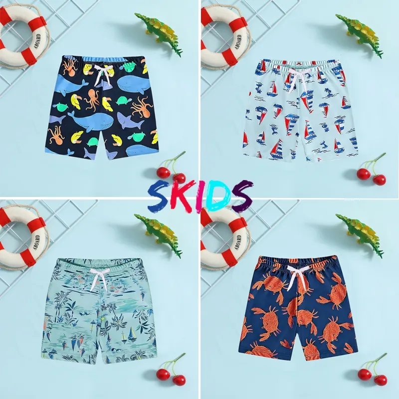 Ảnh Quần bơi cho bé trai SKIDS quần đùi đi biển cho bé 2 đến 10 tuổi họa tiết đáng yêu 1