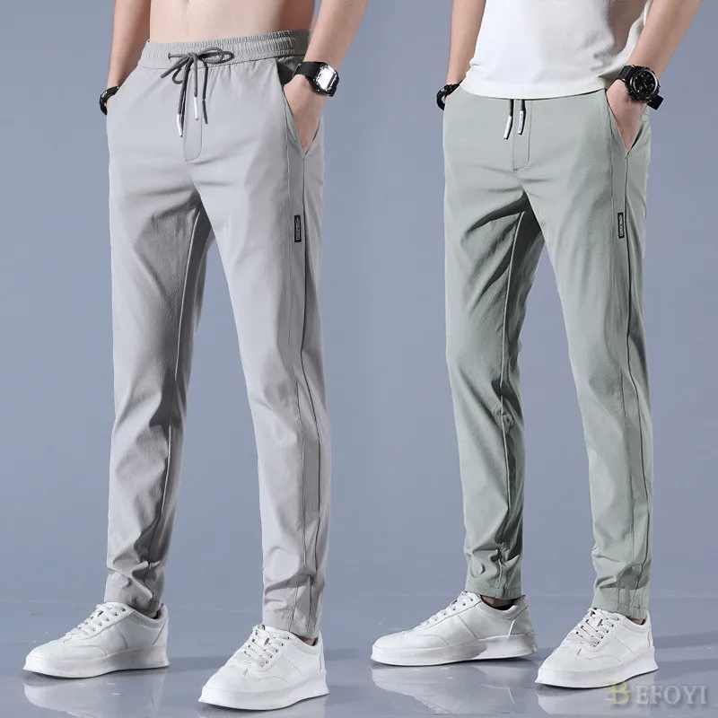 Ảnh Quần Dài Nam Ice Silk Slim Fit Thẳng Chân Doanh Nhân Hàn Quốc Thắt Lưng Co Giãn Màu Đen Plus Size WW008 1