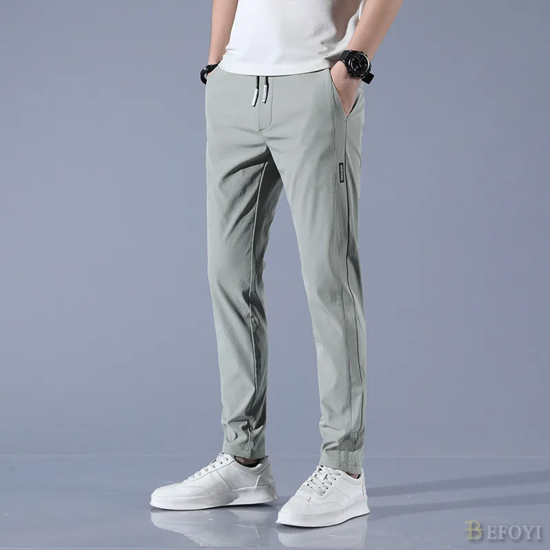 Ảnh Quần Dài Nam Ice Silk Slim Fit Thẳng Chân Doanh Nhân Hàn Quốc Thắt Lưng Co Giãn Màu Đen Plus Size WW008 3