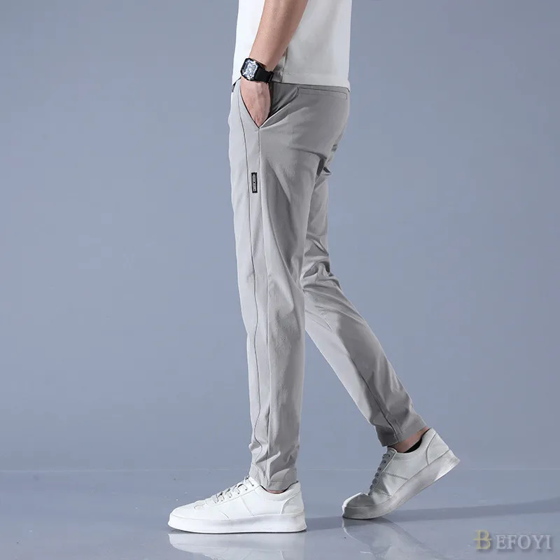 Ảnh Quần Dài Nam Ice Silk Slim Fit Thẳng Chân Doanh Nhân Hàn Quốc Thắt Lưng Co Giãn Màu Đen Plus Size WW008 4