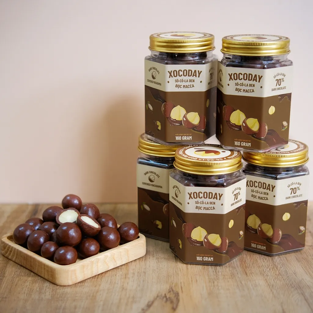 Ảnh XOCODAY - Sô cô la Đen bọc hạt Macca - Hủ 160g - Heyday Cacao - Vị đắng dịu của Chocolate kết hợp hạt macca béo thơm 1